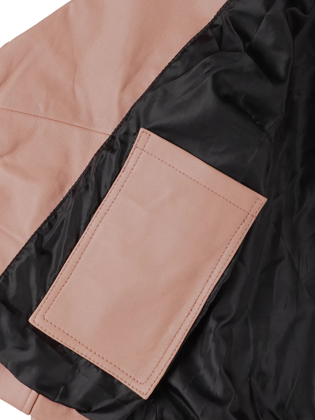 Close-up of black jacket with pink patch pocket.